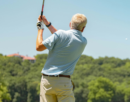 Man playing golf